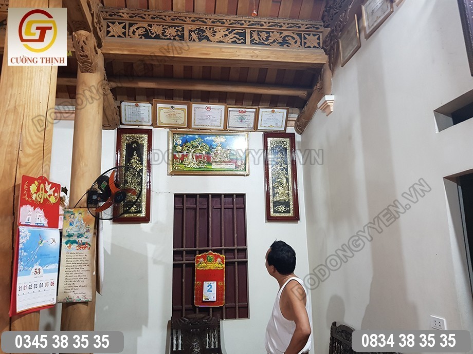 gia chủ cùng tranh đồng